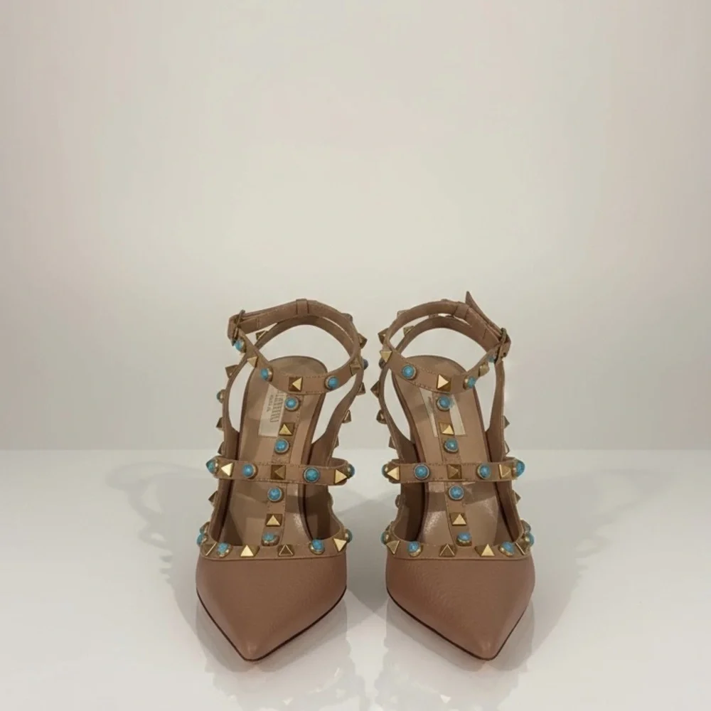 Valentino Rockstud beige pebbled leather with gold and turquoise studs. EUC.